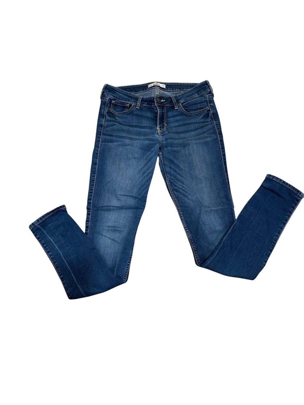 Hollister dark wash skinny stretch jeans, 5 pocket, low rise, some fading, 7R.